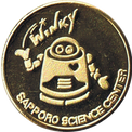 札幌市青少年科学館の案内ロボット「ウィンキー」の金色メダル