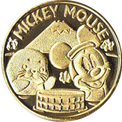 アザラシとミッキーマウスの金色メダル