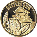 松本城とスティッチの金色メダル